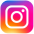 Logo de Instagram. Es la silueta de una cámara en un fondo con gradiente rosado y morado.