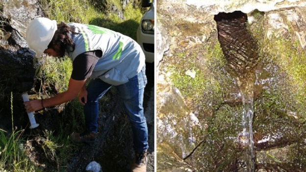 En la foto se ve una funcionaría del Área Metropolitana del Valle de Aburrá recogiendo agua del subsuelo